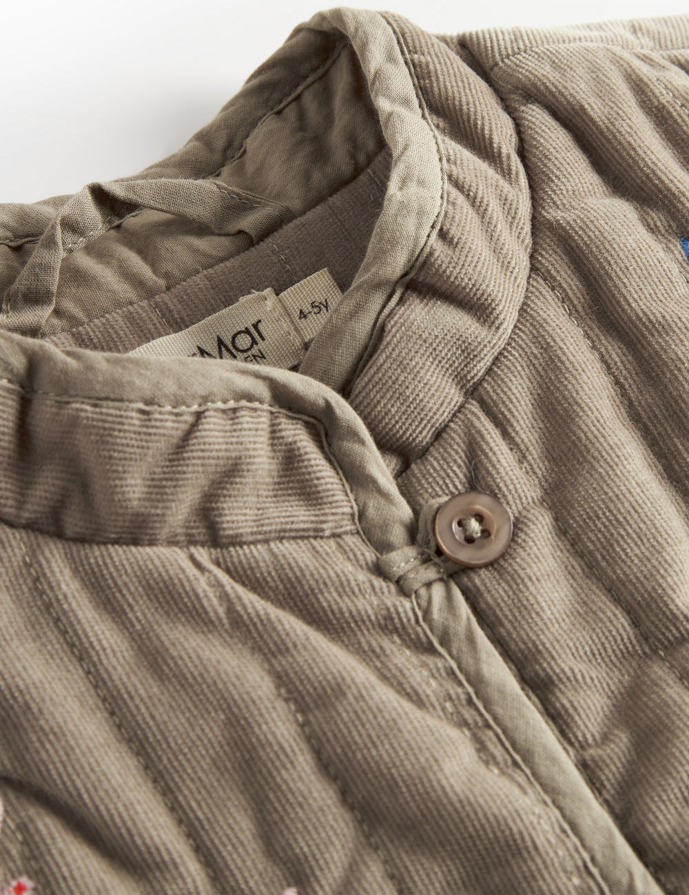 Beige quiltet vest med blomsterbroderi til børn