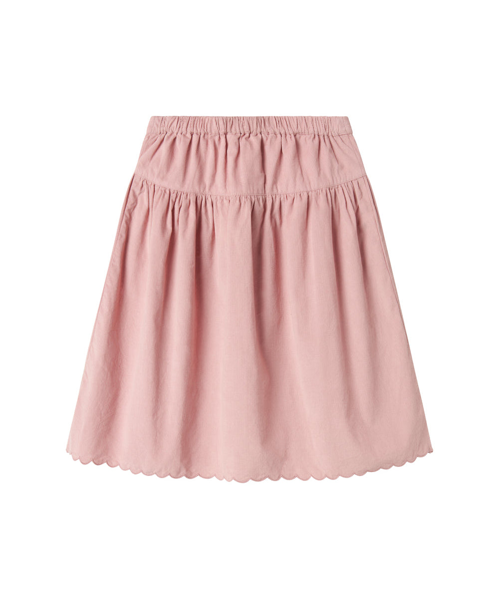 Lyserød nederdel i babyfløjl med knapper og bølgekant til børn