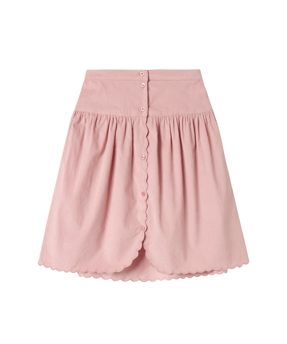 Lyserød nederdel i babyfløjl med knapper og bølgekant til børn