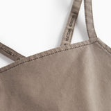 Detaljebillede af stropper på selebukser til børn