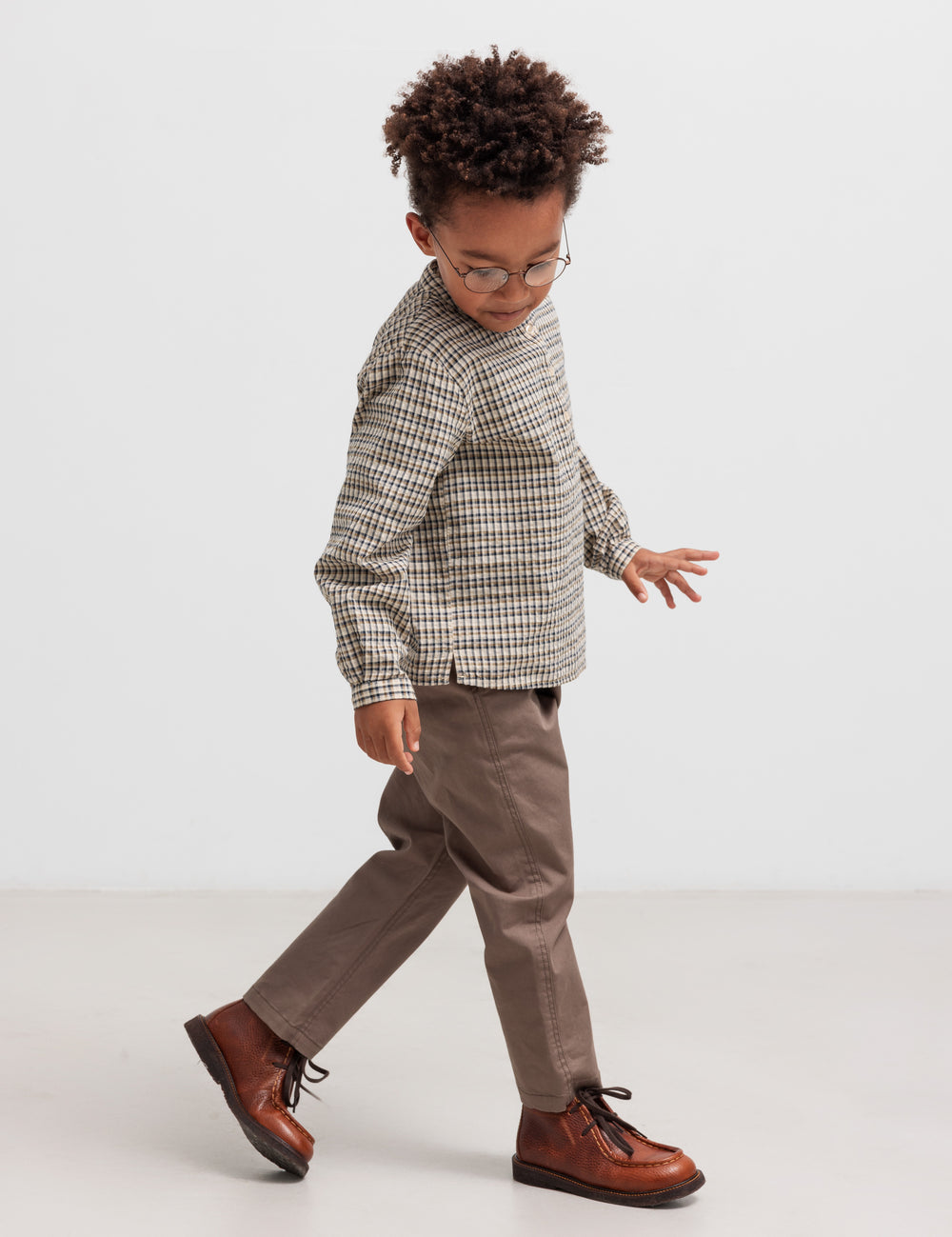 Boy wearing brown checked shirt in crepe cotton