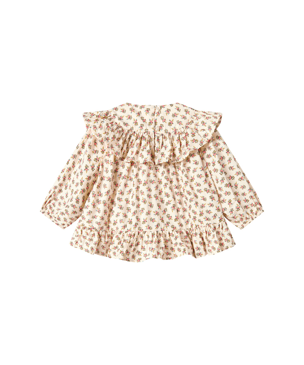 Kjole med blomstermønster og rund krave