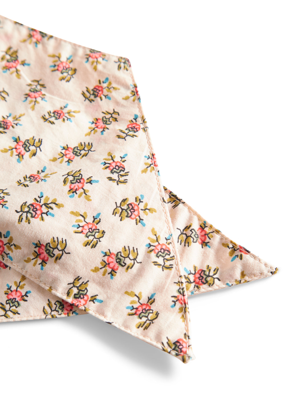 Nærbillede af bindebånd med blomsterprint