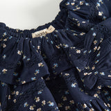 Mørkeblå blomstermønstret heldragt til baby med lange ærmer