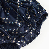 Mørkeblå blomstermønstret heldragt til baby med lange ærmer