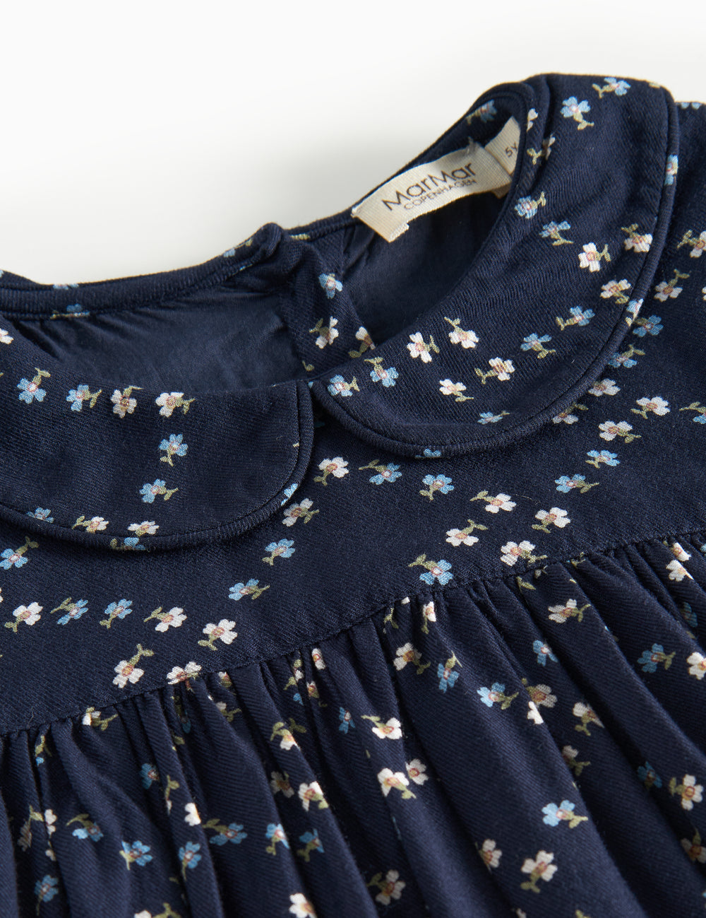 Mørkeblå blomstermønstret kjole til børn med lange ærmer og krave