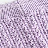 Strikkede lilla leggings til baby i blødt bomuld