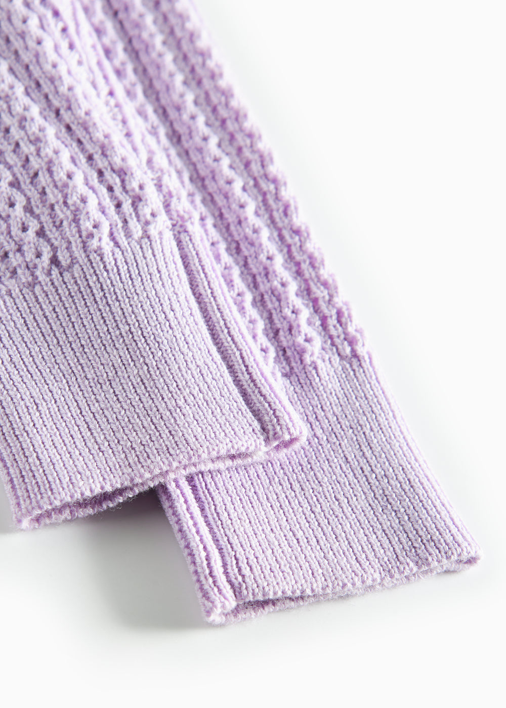 Strikkede lilla leggings til baby i blødt bomuld