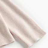 Offwhite cardigan til børn med krave og knaplukning foran