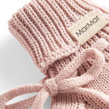 Lyserød strik babyfutter