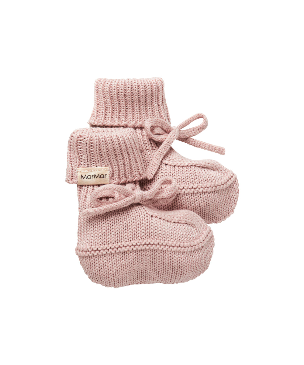 Lyserød strik babyfutter