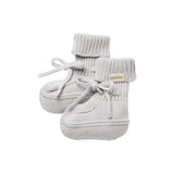 Grå strik babyfutter