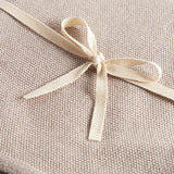 Beige strikket babytæppe