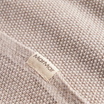 Beige strikket babytæppe