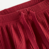 Røde ribbede babybukser med snøre i taljen