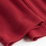 Røde ribbede babybukser med snøre i taljen