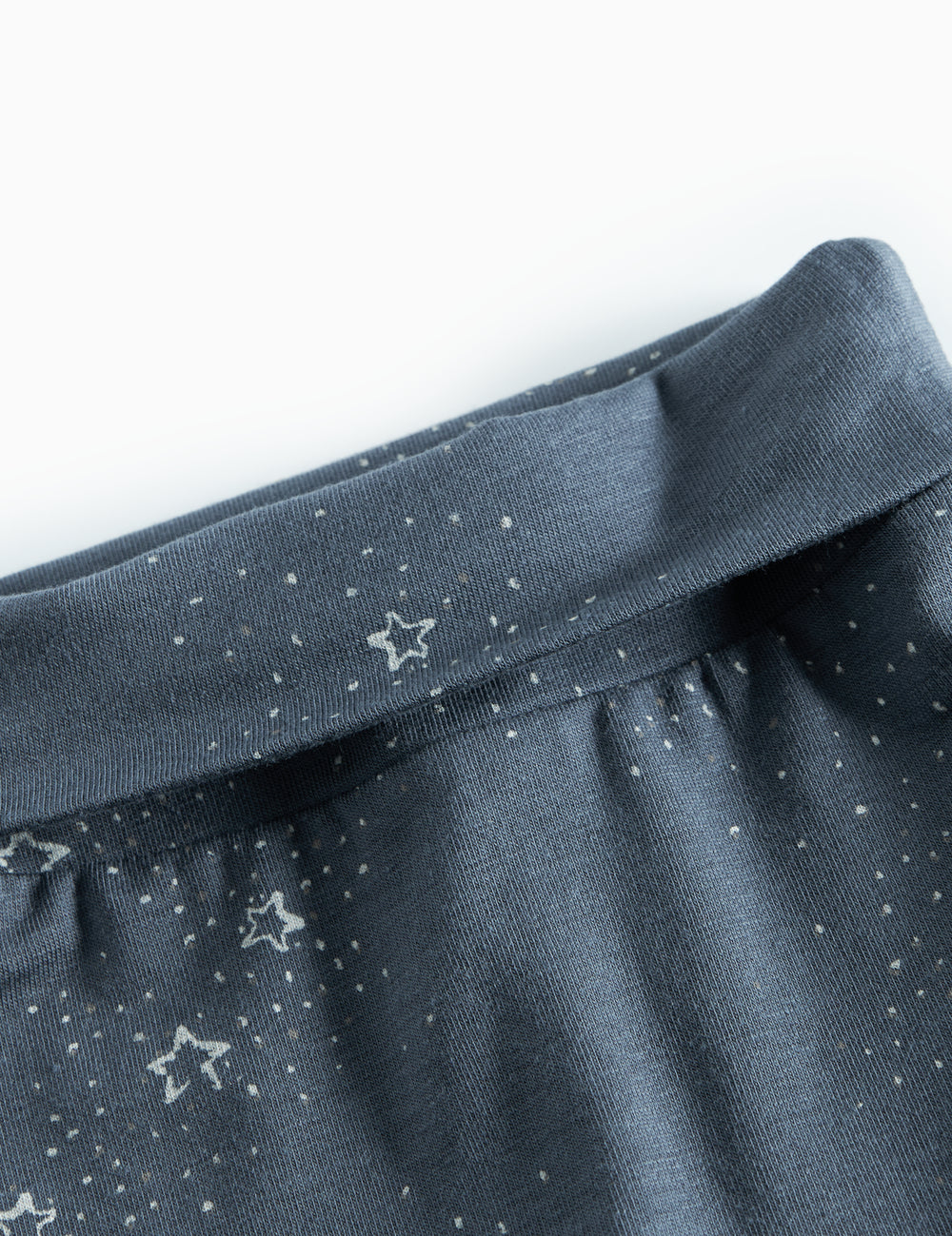 Dark blue baby trousers with star print