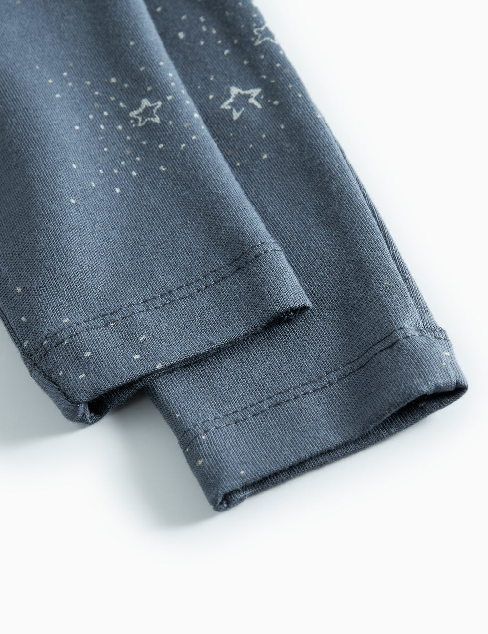 Dark blue baby trousers with star print
