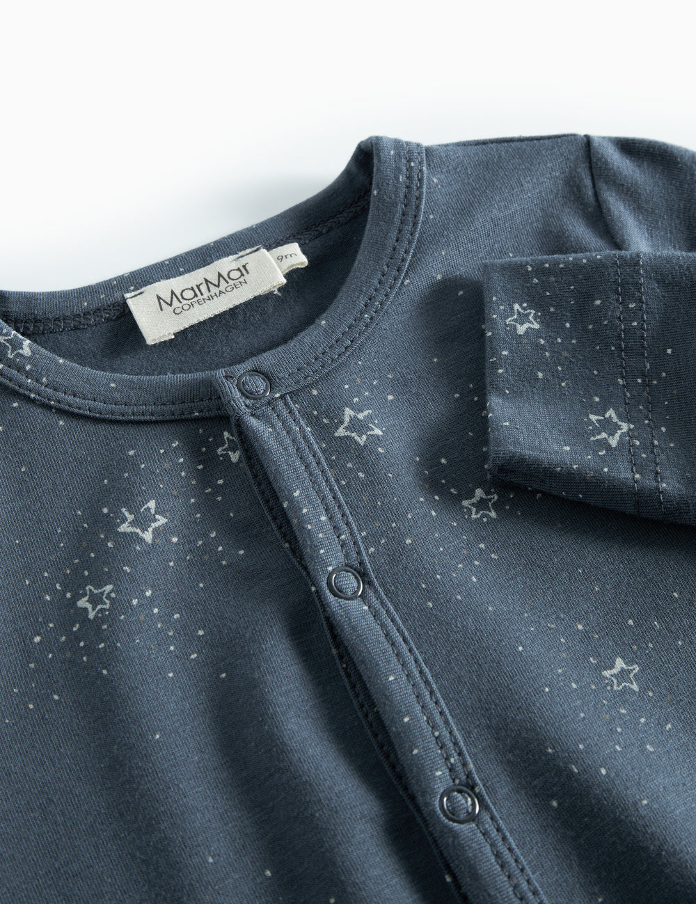 Mørkeblå baby heldragt med stjerneprint til