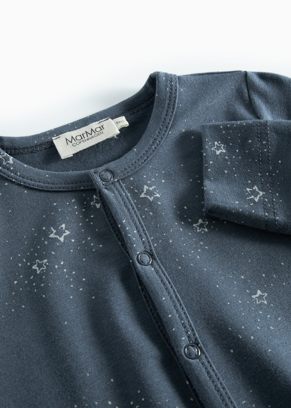 Mørkeblå baby heldragt med stjerneprint til