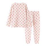 Cremefarvet julepyjamas med mønster af røde juleklokker til børn