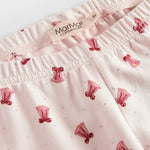 Cremefarvet julepyjamas med mønster af røde juleklokker til børn