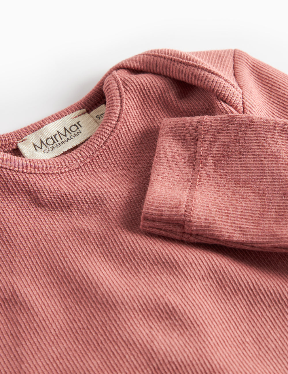 Dusty pink ribbed long-sleeved bodysuit for baby