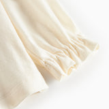 Hvud festbluse med hvid krave og små blomsterbroderier til børn