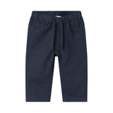 Mørkeblå bukser med elastisk talje og bindebånd i blødt stof til baby