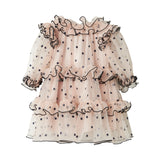 Lyserød julekjole i tyl med sorte prikker og flæser til baby