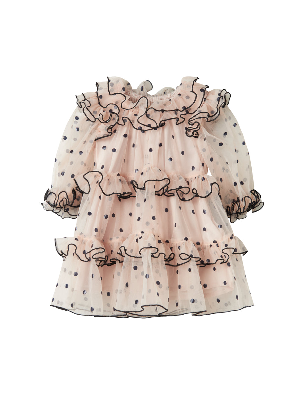 Close-up of pink tulle dress for children with black dots and wavy ruffled edges