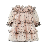 Lyserød julekjole i tyl med sorte prikker og flæser til baby