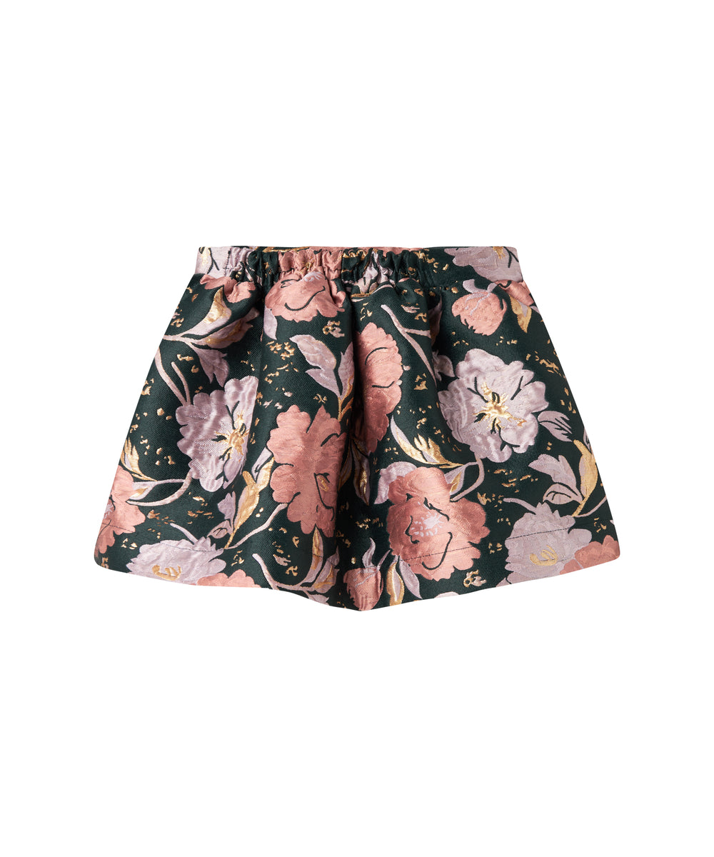 Kort mørkegrøn nederdel med store blomster og sløjfedetalje til børn