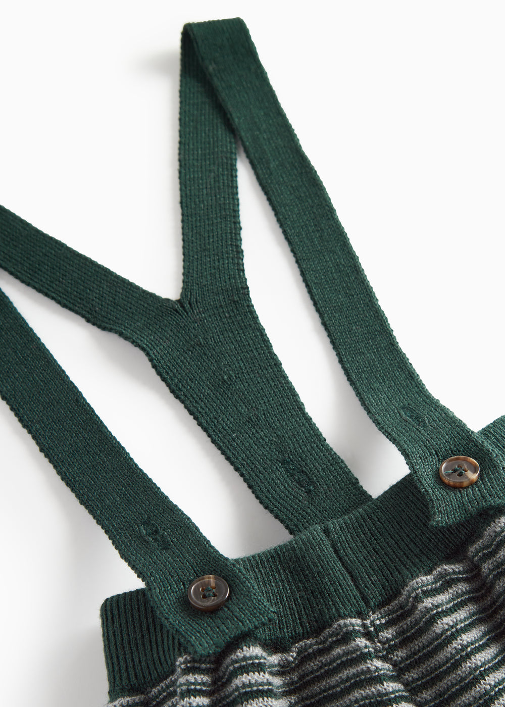 Mørkegrønne strikkede bukser med seler og fine striber til baby