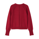 Rød juletrøje med fine hulmønstre og ribkanter til børn