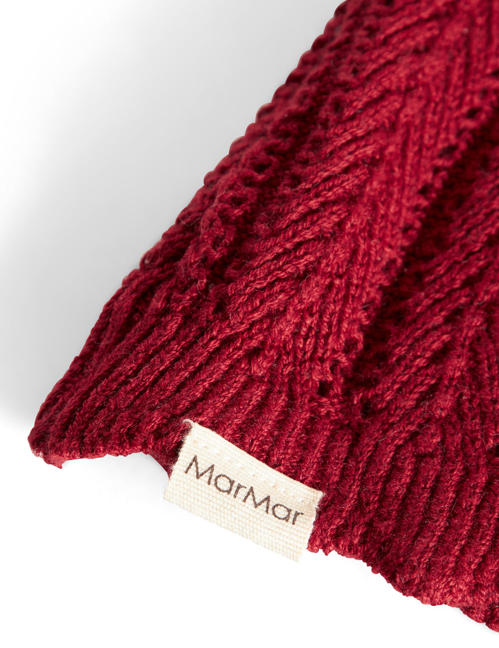 Rød strikket nissehue med kvast til baby