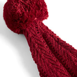 Rød strikket nissehue med kvast til baby