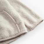 Beige fleece jacket with buttons and pockets for children