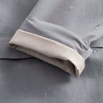 Gray transition jacket with hat, zipper, and pockets for baby