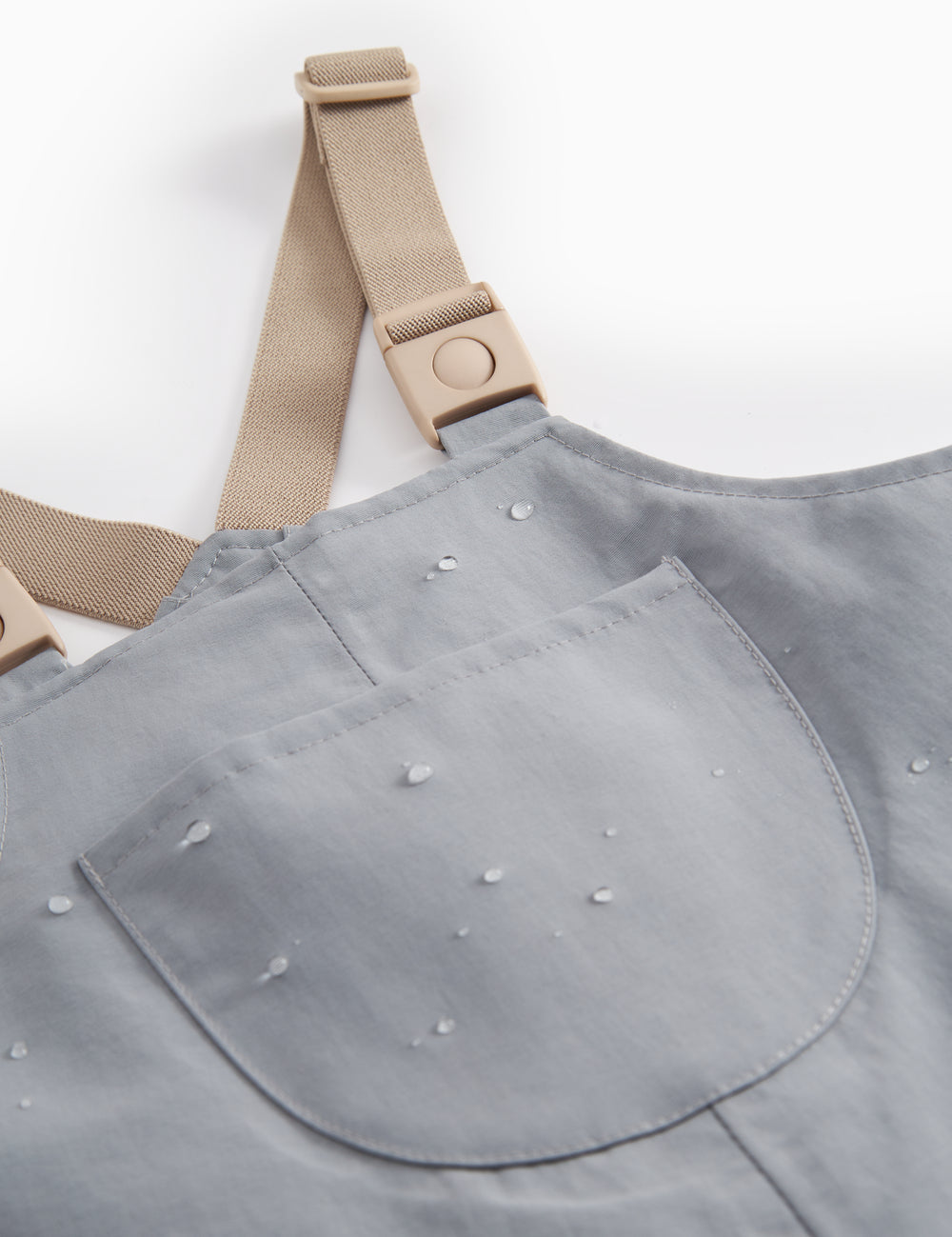 Gray overalls with pockets and footies for children