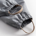 Grå overtræksbukser med seler og fodstropper til børn