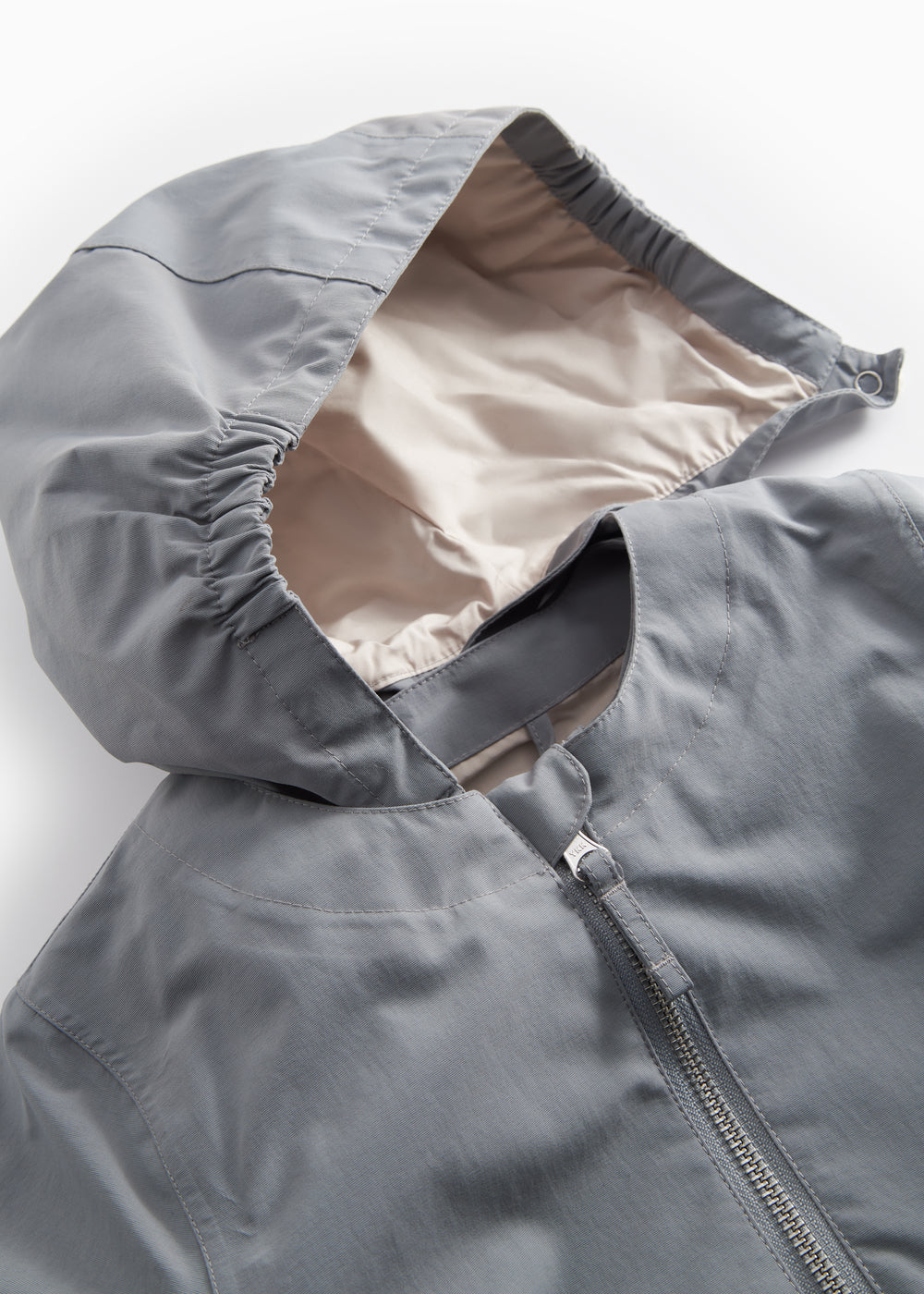 Grå overgangsjakke med hætte og lommer til børn