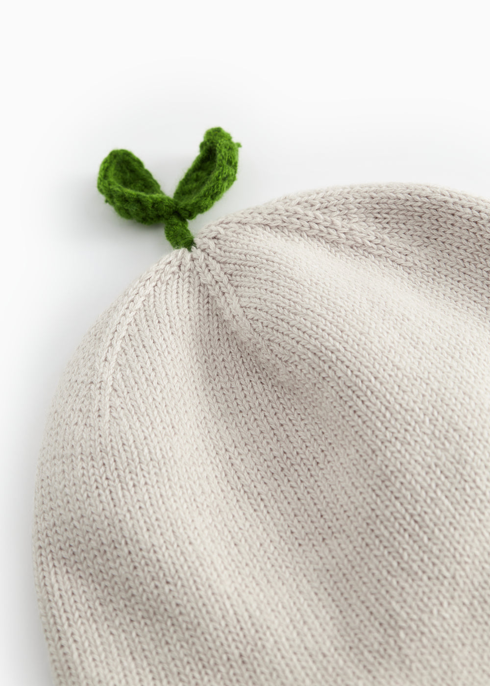 Striped hat for baby with small detail