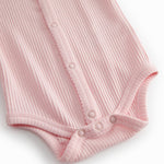 Red ribbed modal leggings for children.