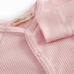 Lyserød langærmet baby heldragt med knapper