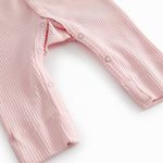 Red long-sleeved baby outfit with buttons