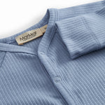 Light blue long-sleeved baby outfit with buttons