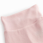 Lyserøde babybukser med fødder til de nyfødte