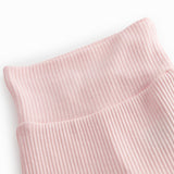 Lyserøde babybukser med fødder til de nyfødte