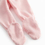 Red baby pants with feet for newborns.